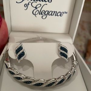 Platinum over bronze sapphire and diamond necklace and earring set. Never worn.